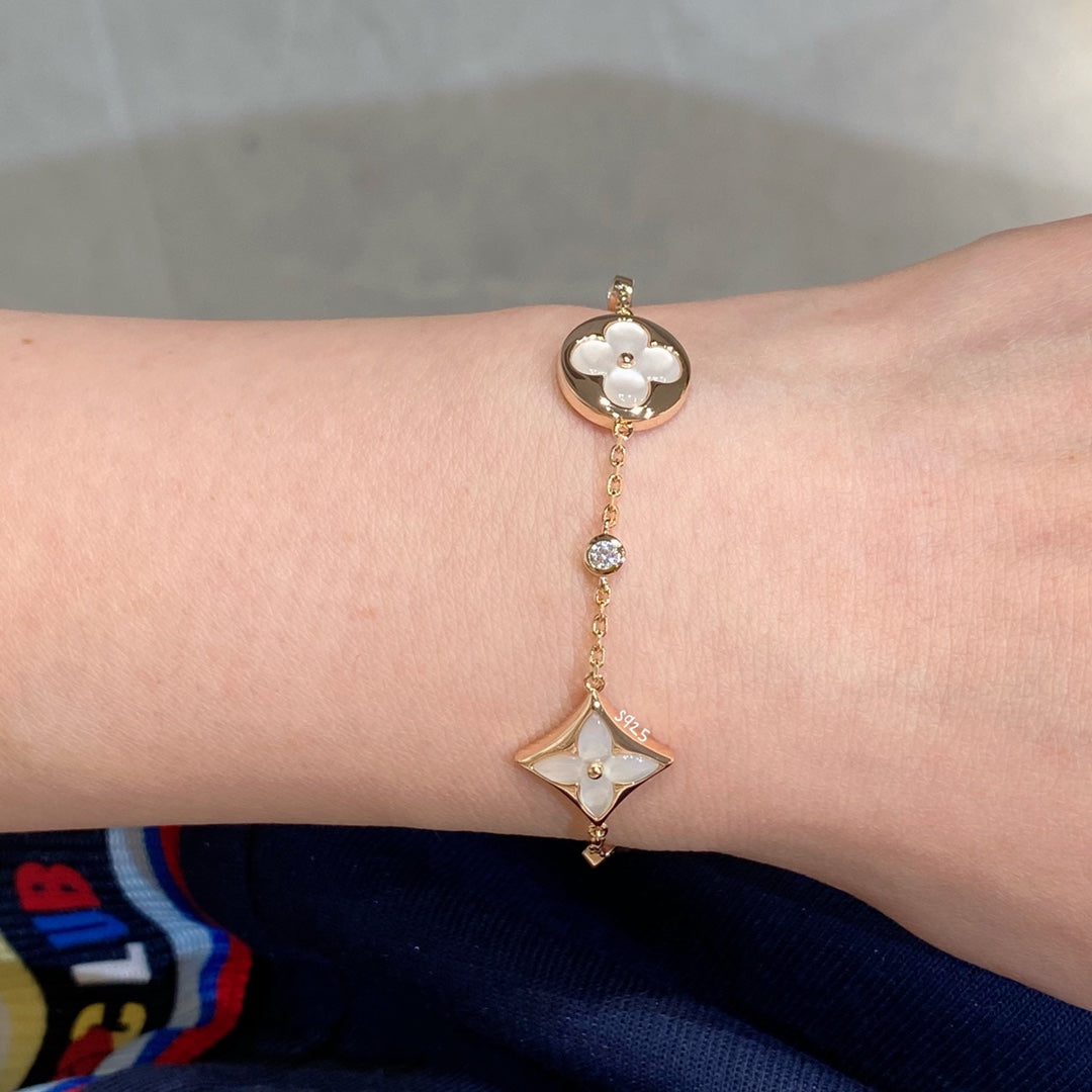 [Clara Jewels]STAR AND SUN 4 MOTIF WHITE MOP PINK GOLD BRACELET